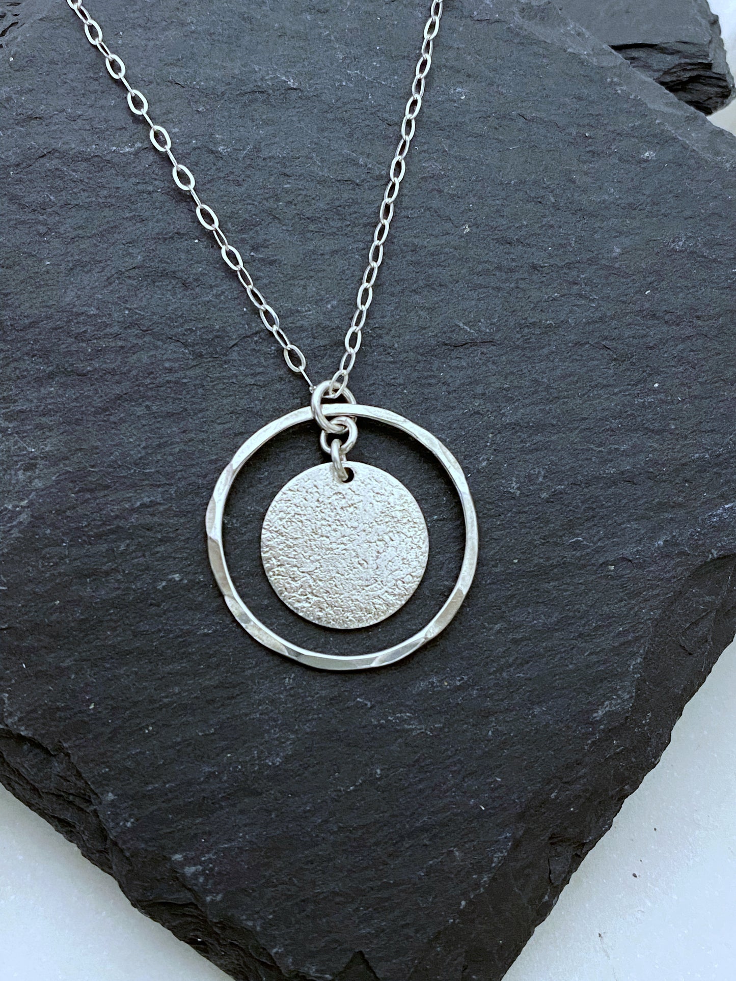 Sterling silver forged hoop necklace with sterling disk