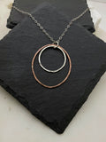 Sterling silver and copper forged hoop necklace