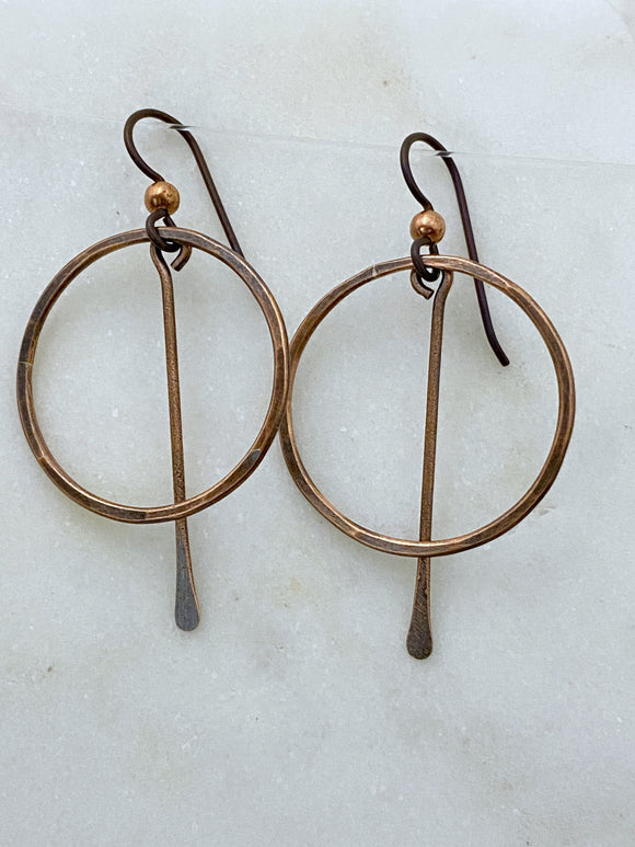 Forged Copper hoop earrings with paddle center