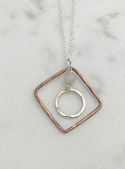 Sterling silver and copper forged hoop necklace with moonstone
