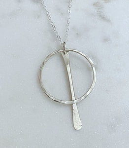 Long forged hoop necklace with paddle