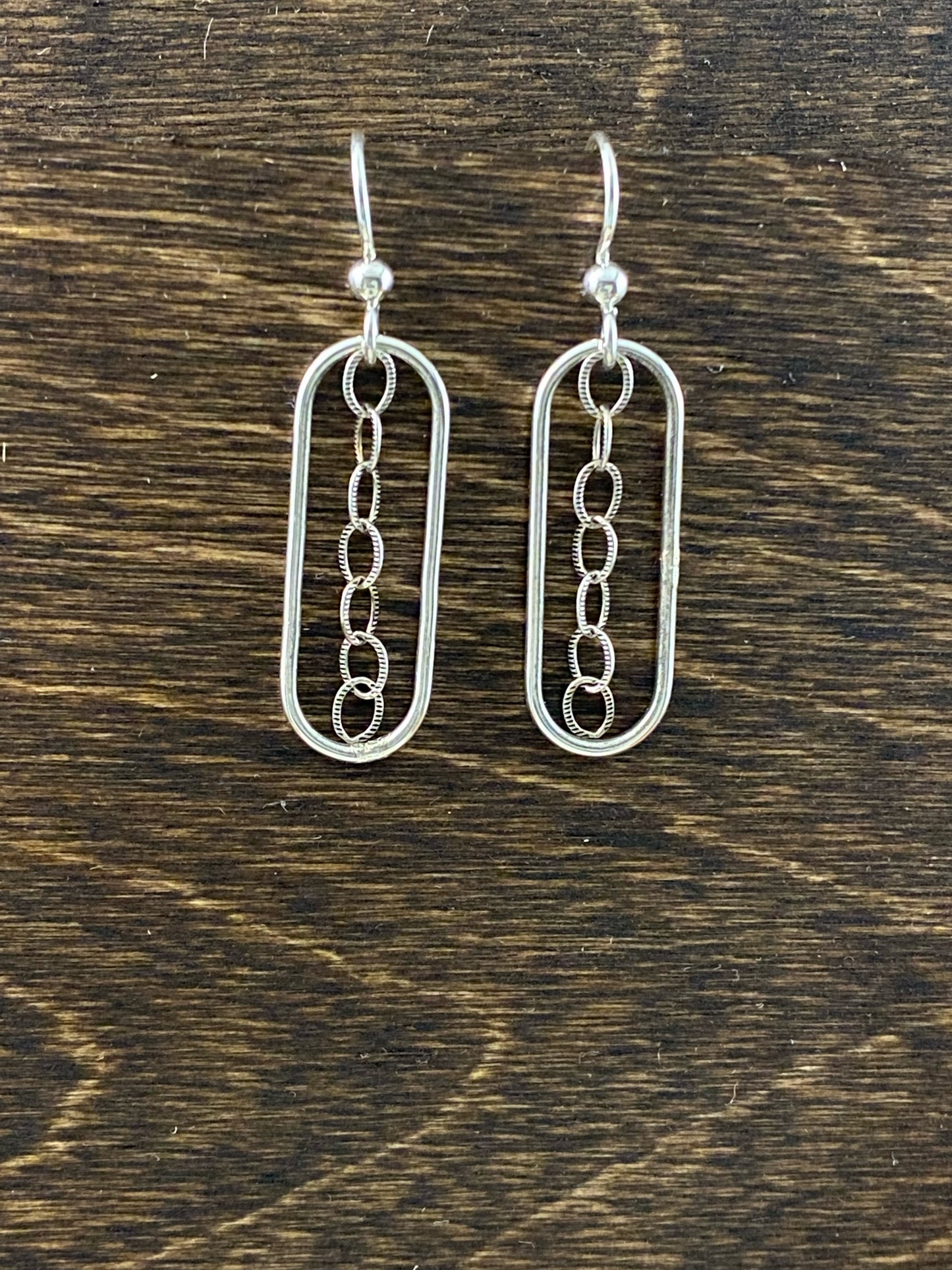 Sterling silver forged oval hoops with chain