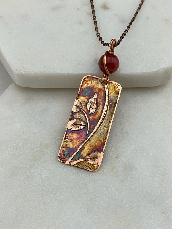 Acid etched copper leaf necklace with coral gemstone