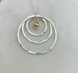 Sterling silver forged hoop necklace with gold-fill bead