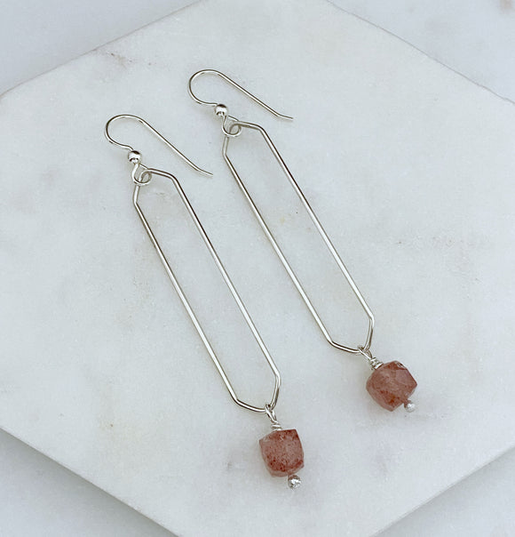 Sterling silver hammer textured oval hoops with strawberry quartz