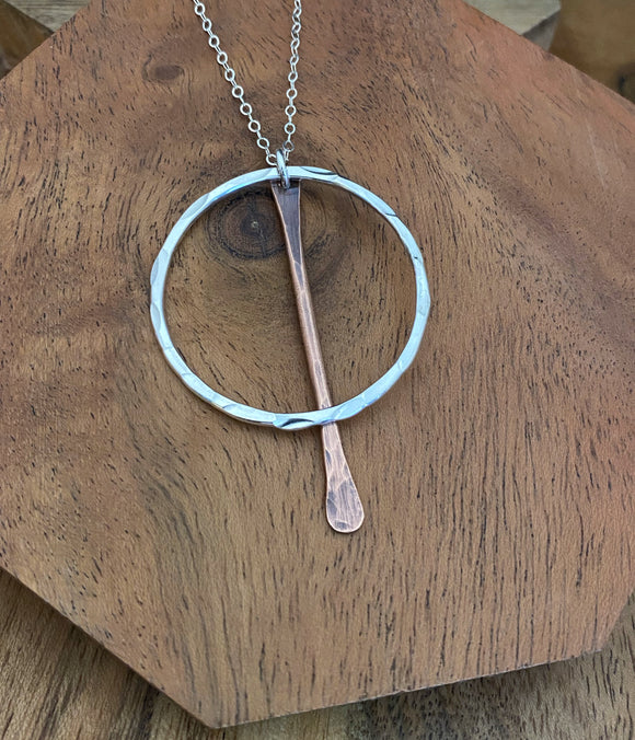 Sterling silver forged hoop with copper paddle