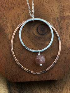 Sterling silver and copper forged hoop necklace with strawberry quartz