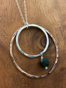 Sterling silver and copper forged hoop necklace with emerald