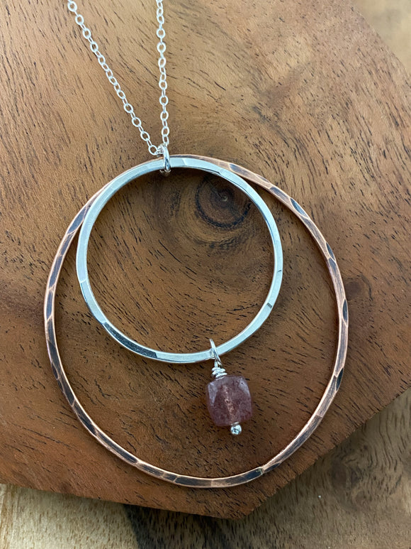 Sterling silver and copper forged hoop necklace with strawberry quartz