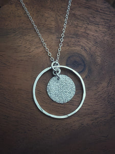Forged sterling hoop necklace with sterling disk