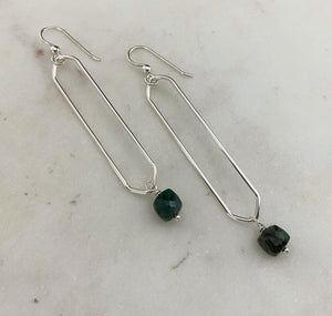 Sterling silver hammer textured oval hoops with emerald