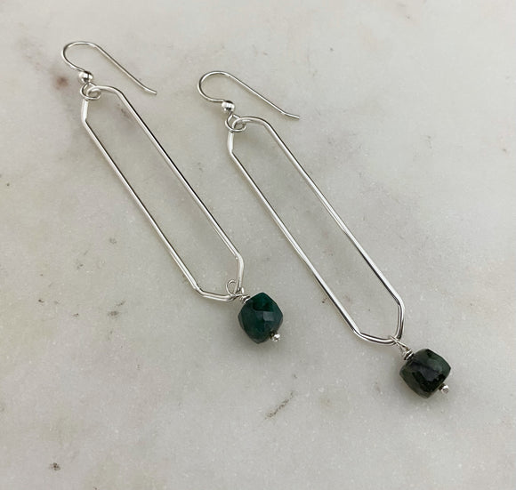 Sterling silver hammer textured oval hoops with emerald