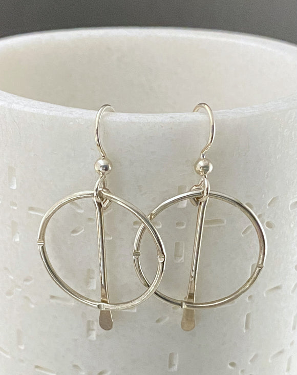 Sterling silver forged hoop earrings with paddle