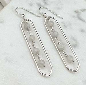 Sterling silver hammer textured oval hoops with moonstone