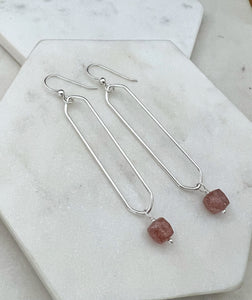 Sterling silver oval hoops with strawberry quartz
