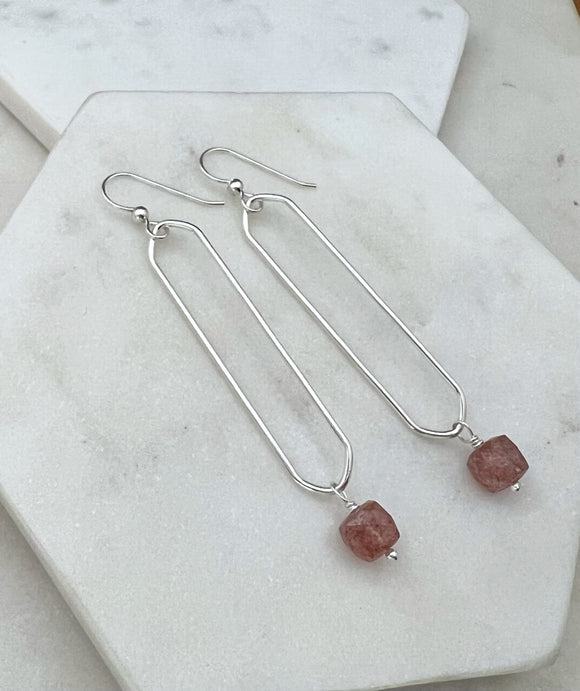 Sterling silver oval hoops with strawberry quartz