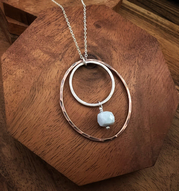 Sterling silver and copper forged hoop necklace with blue opal