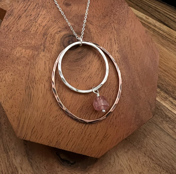 Sterling silver and copper forged hoop necklace with strawberry quartz