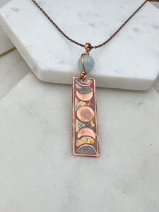 Moon phase acid etched copper necklace with aquamarine gemstone