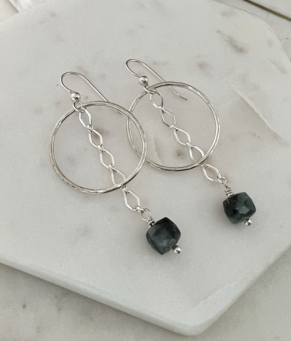 Sterling silver hoops with emerald