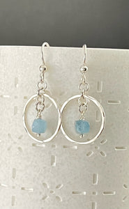 Sterling silver hoops with aquamarine