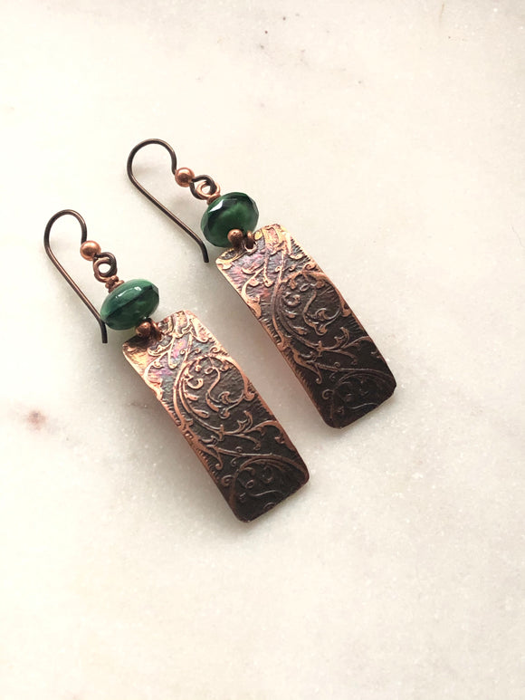 Acid etched copper swirl earrings with green tiger’s eye gemstone