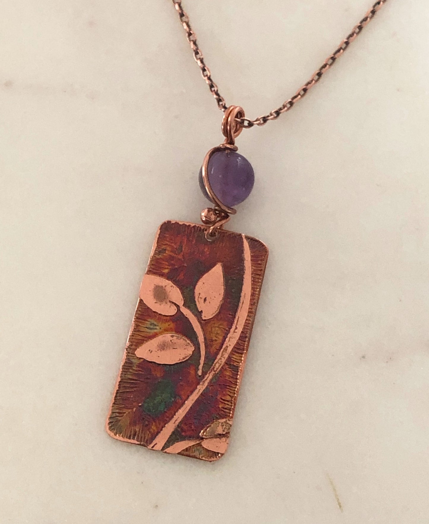 Acid etched copper leaf necklace with amethyst