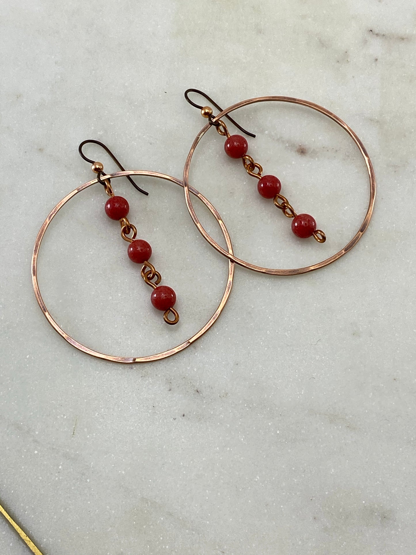 Forged copper earrings with coral