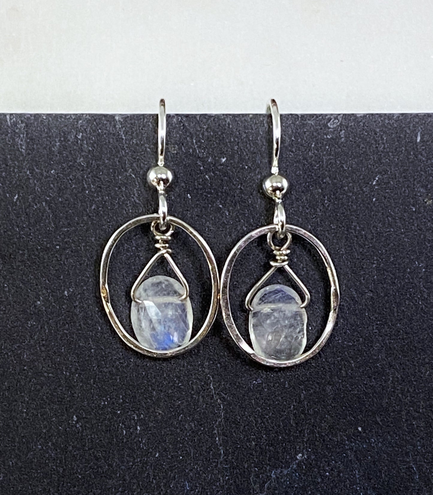 Sterling silver small forged oval hoop with rainbow moonstone