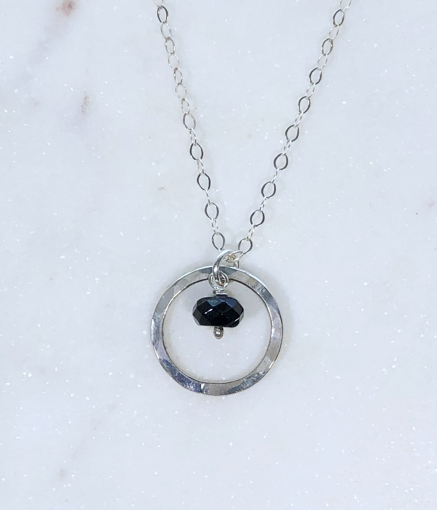 Sterling silver forged circle necklace with onyx gemstone