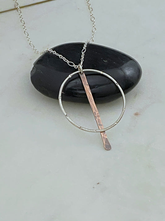 Sterling silver forged hoop necklace with copper paddle
