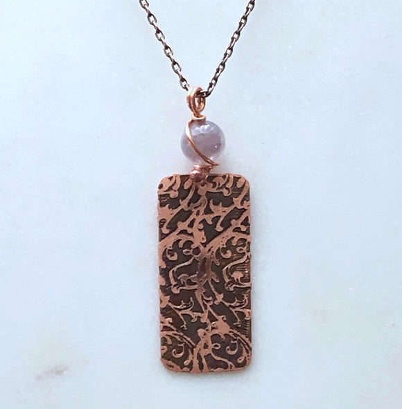 Acid etched copper swirl necklace with amethyst
