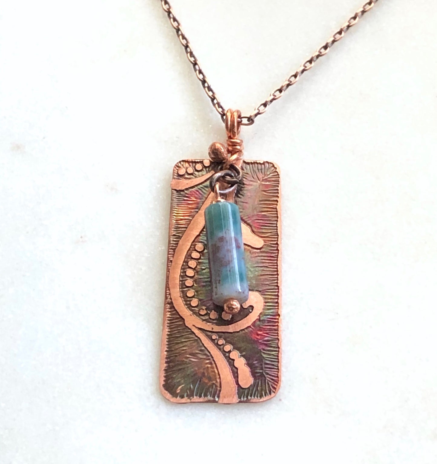 Acid etched copper swirl necklace with moss agate