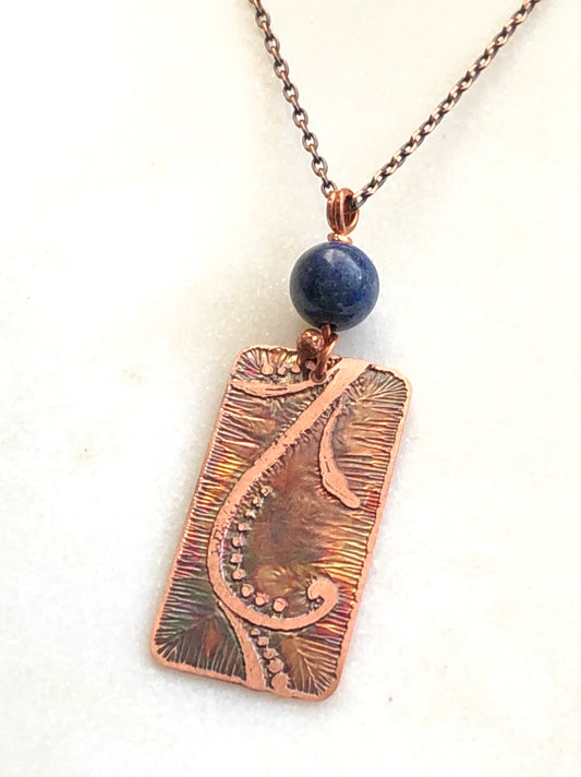 Acid etched copper swirl necklace with lapis