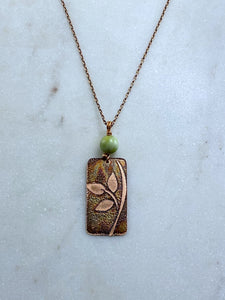 Acid etched copper leaf necklace with green garnet