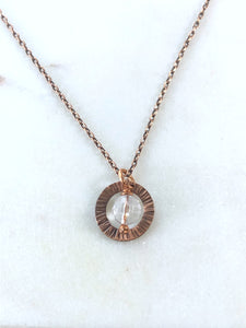 Copper textured circle necklace with quartz