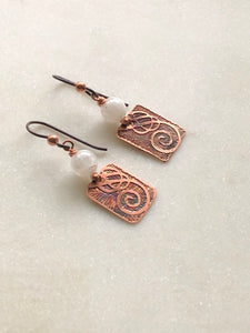 Acid etched copper swirl earrings with moonstone