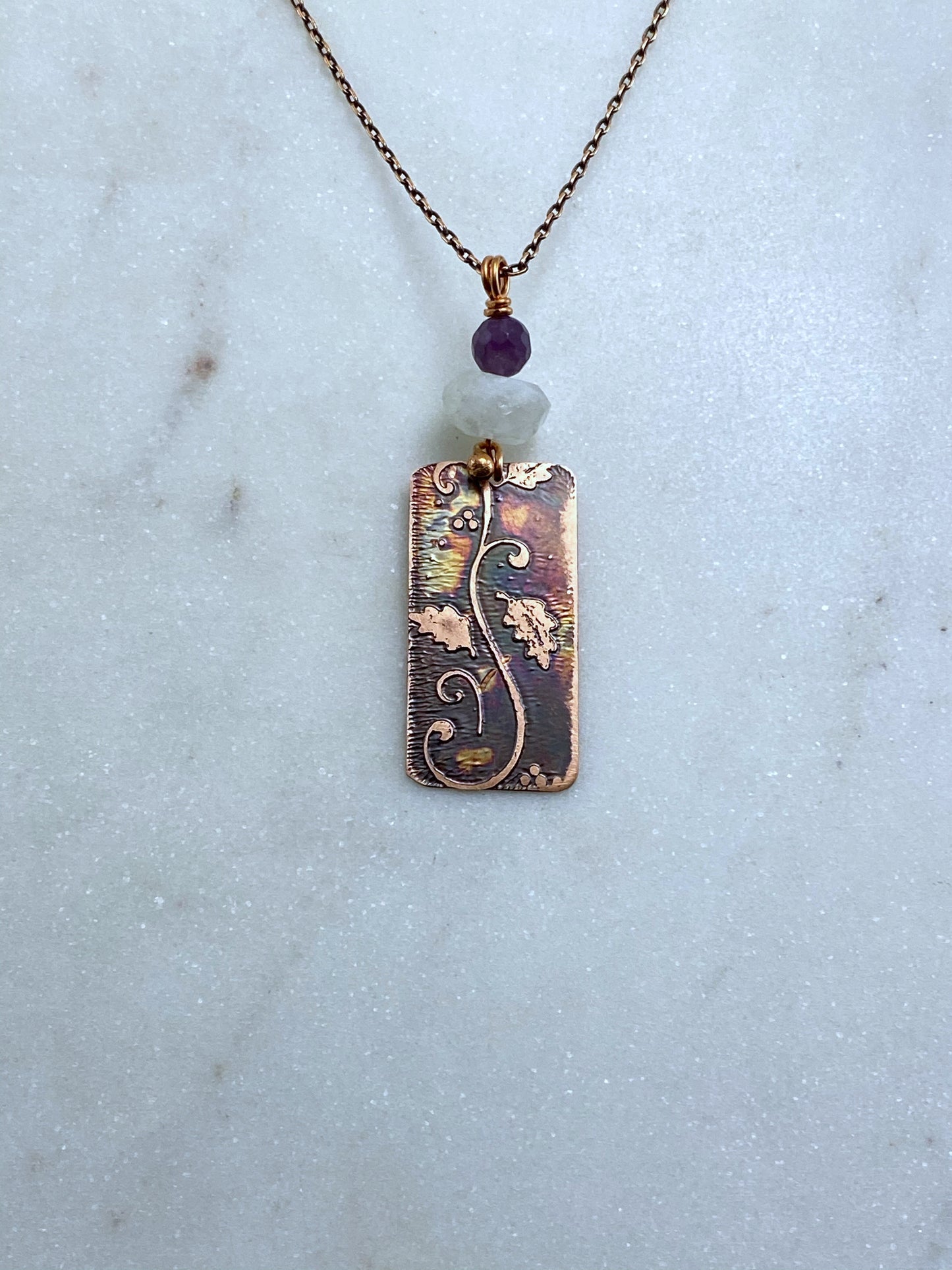 Acid etched copper swirl necklace with amethyst and moonstone
